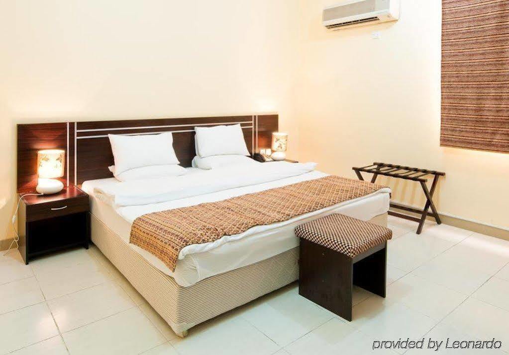 La Villa Hotel Doha Kamer foto